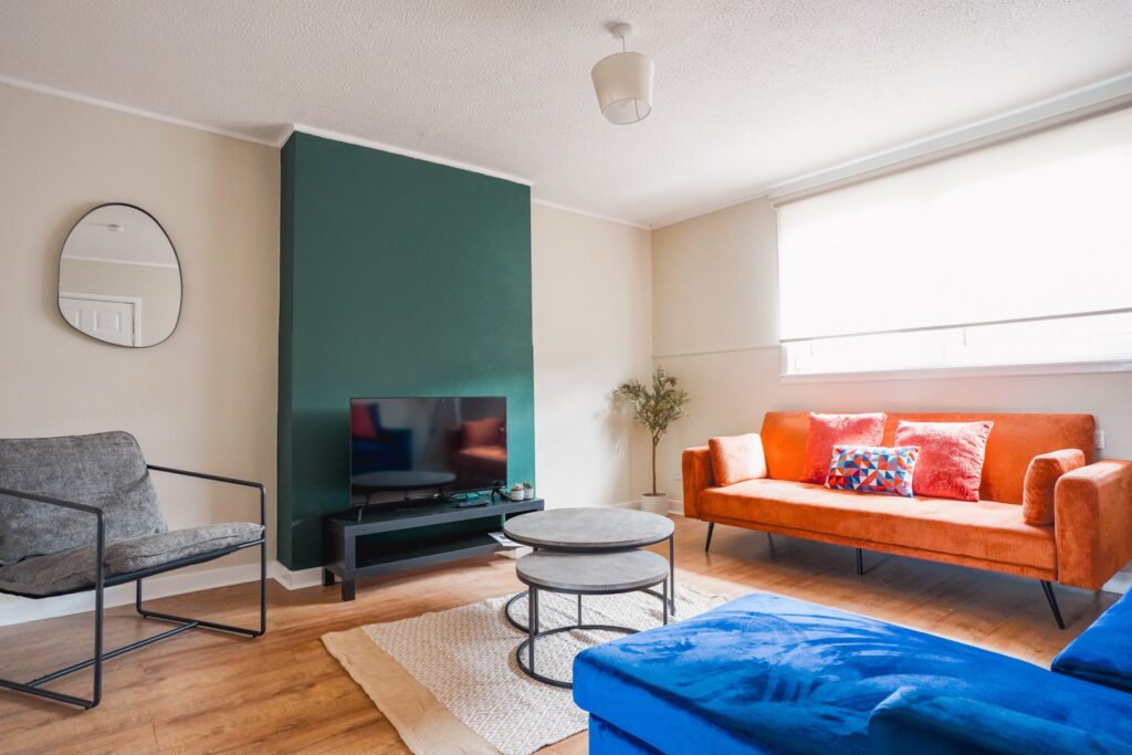 Spacious living area in contractors accommodation in Hamilton with comfortable seating